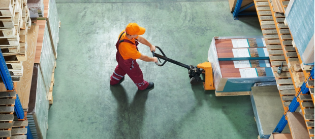 Warehouse worker near pallets